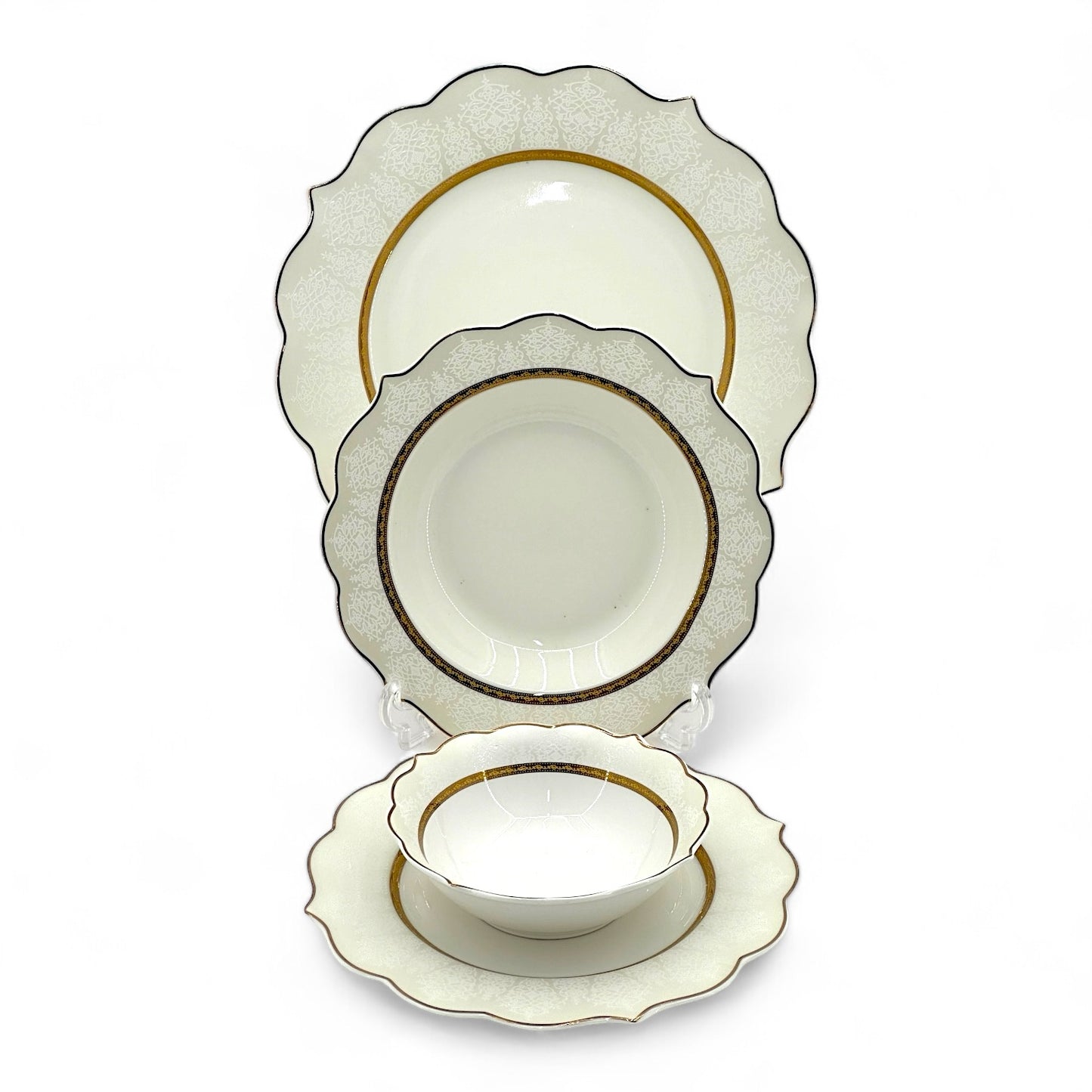 Elegant 24-piece ceramic dinnerware set with engraved decorative ornament