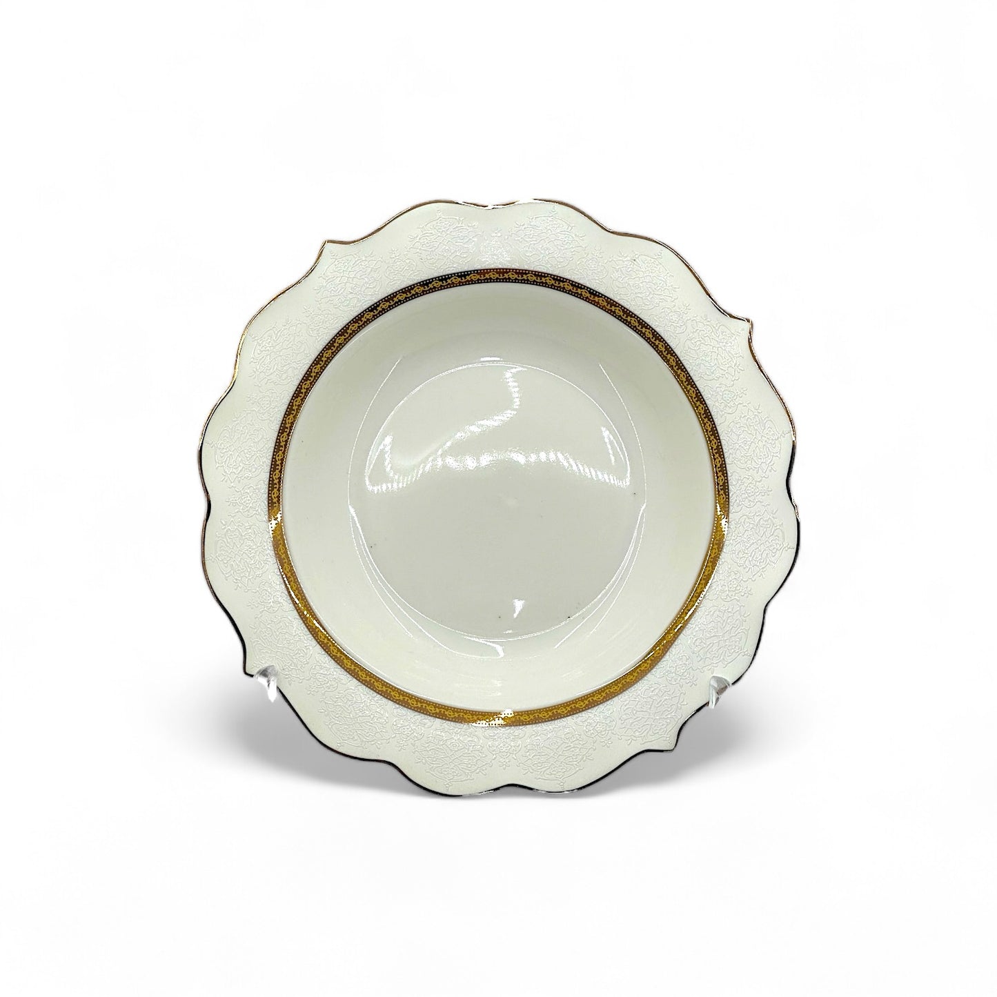 Elegant 24-piece ceramic dinnerware set with engraved decorative ornament