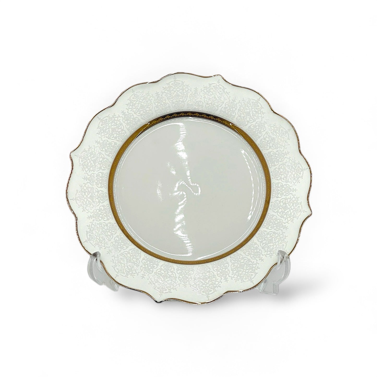 Elegant 24-piece ceramic dinnerware set with engraved decorative ornament