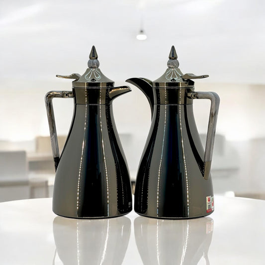 Elegant Black Flask Set with Intricate Lid Design