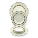 Elegant 24-piece ceramic dinnerware set with engraved decorative ornament
